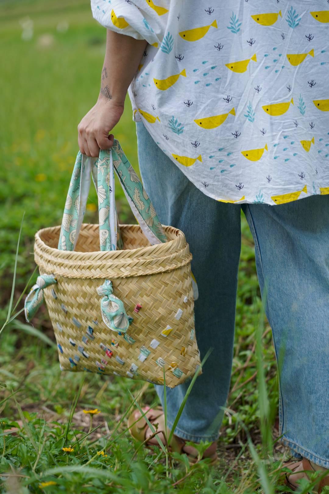 Handmade bag made from woven bamboo and upcycled  reversible fabric handles online at Siesta o'Clock India