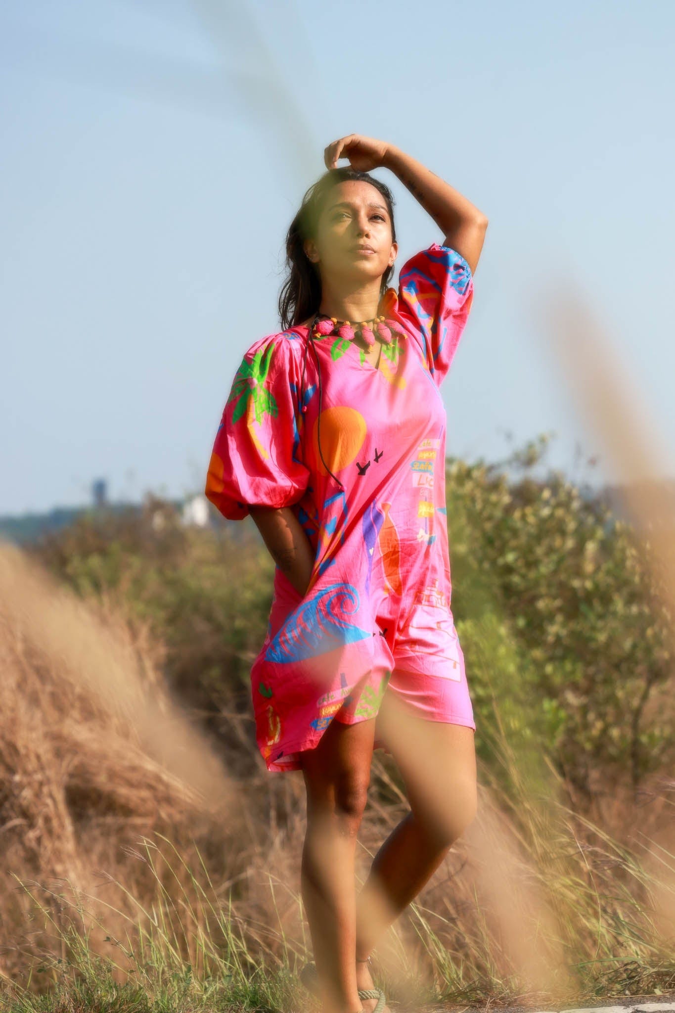 Deep pink short dress in organic cotton - featuring an Artist Edit print inspired by Agonda Beach