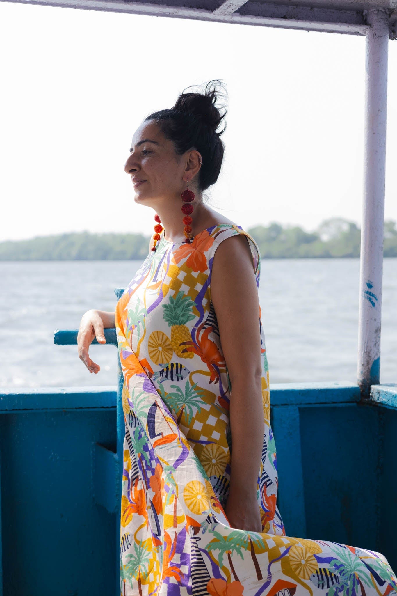 Off white maxi-dress with a tropical vacation print