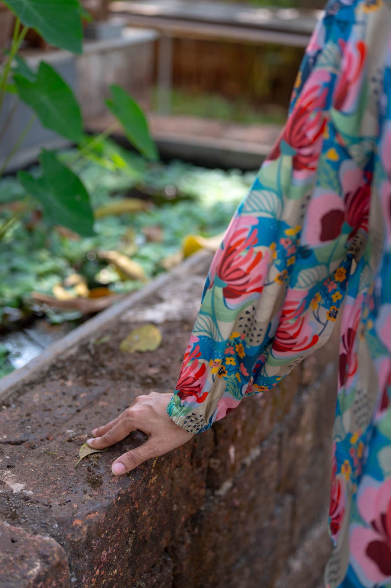 Beachy vibes guaranteed with this floral shirt for women